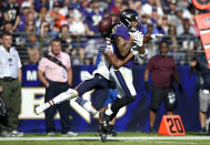 <p>Baltimore Ravens wide receiver Chris Moore, right, is unable to catch a pass attempt as he is tackled by Chicago Bears cornerback Kyle Fuller in the second half of an NFL football game, Sunday, Oct. 15, 2017, in Baltimore. (AP Photo/Nick Wass) </p>