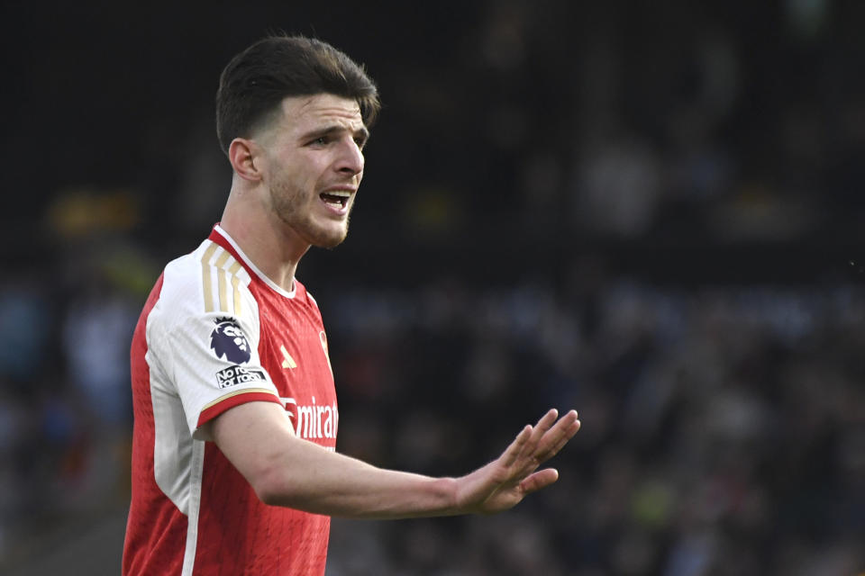 Arsenal's Declan Rice reacts during the English Premier League soccer match between Wolverhampton Wanderers and Arsenal at the Molineux Stadium in Wolverhampton, England, Saturday, April 20, 2024. (AP Photo/Rui Vieira)