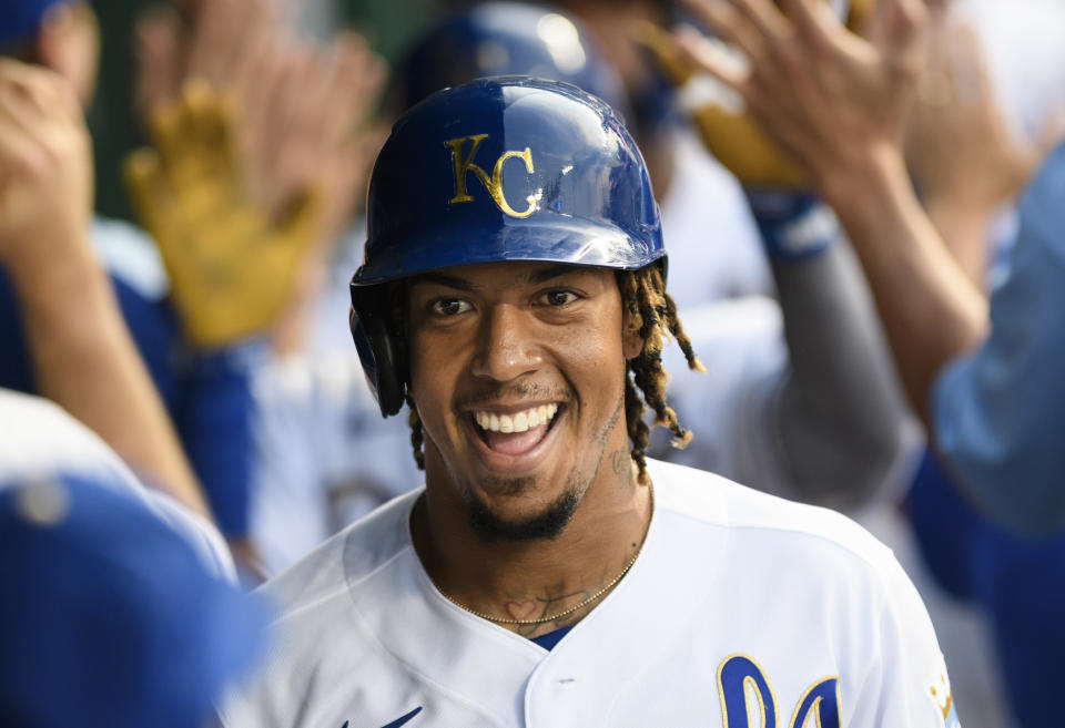 Kansas City Royals' Adalberto Mondesi smiles after hitting a home run against the Boston Red Sox during the third inning of a baseball game in Kansas City, Mo., Friday, June 18, 2021. (AP Photo/Reed Hoffmann)