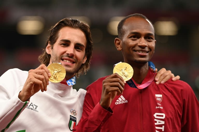 Mutaz Essa Barshim and Gianmarco Tamberi shared the gold medal at the Tokyo Olympics in a moment that caught the world's imagination (Ina FASSBENDER)