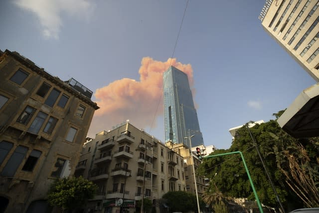 A cloud from a massive explosion is seen in in Beirut (Hasssan Ammar/AP)