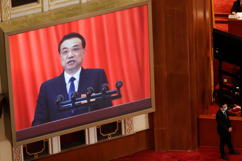 Chinese Premier Li Keqiang delivers a speech at the opening session of NPC in Beijing