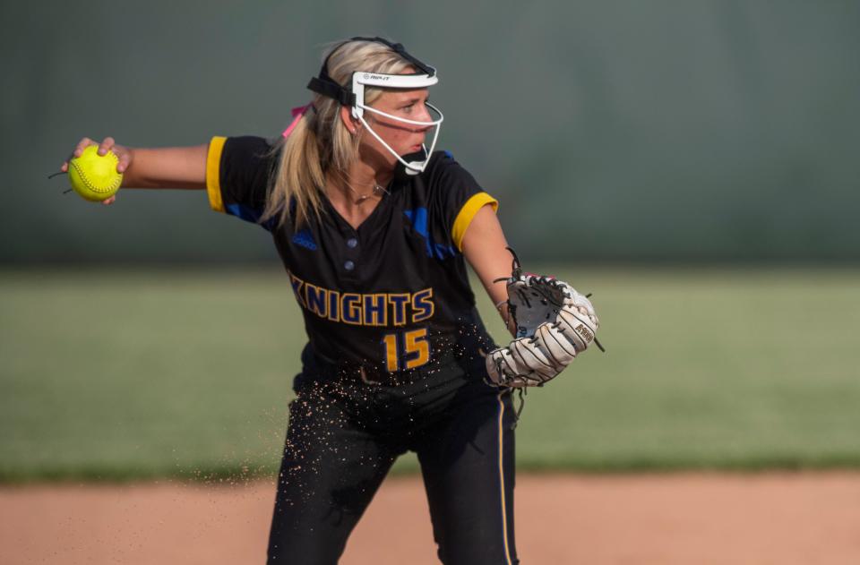 Castle's  Mati Hughes (15) throws to first as the Castle Knights play the Central Bears during the 2023 IHSAA 4A softball sectional at North high School Tuesday, May 23, 2023. 