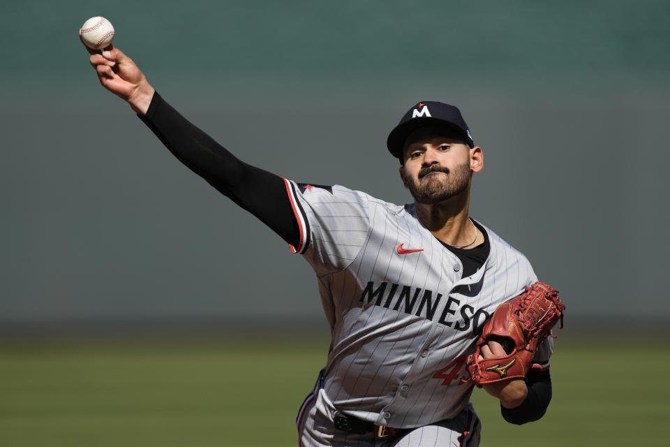 Minnesota Twins starting pitcher Pablo Lopez throws during the first inning of a baseball game against the Kansas City Royals Thursday, March 28, 2024, in Kansas City, Mo. (AP Photo/Charlie Riedel)