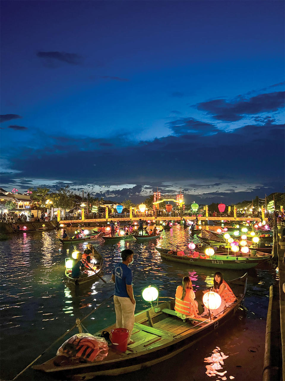 Feldman’s snapshot of the busy lantern-lit waterfront area in Hoi An.