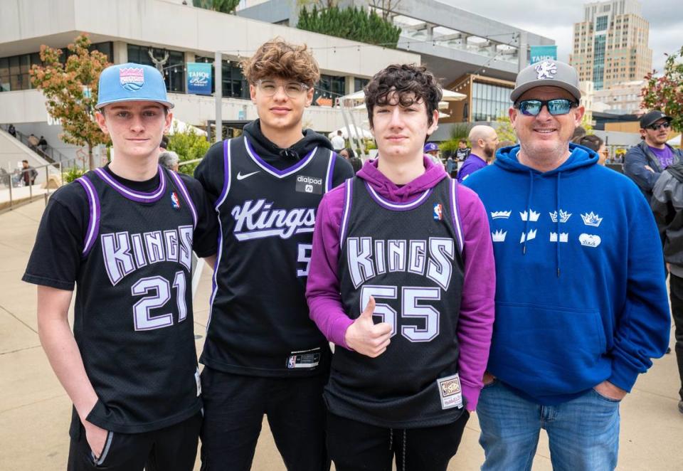 From left, Harrison Barley, Jameson Malvesta, Wyatt Hansen and Rob Barley wait in line to enter Golden 1 Center on Sunday to see the Sacramento Kings game against the Portland Trailblazers.