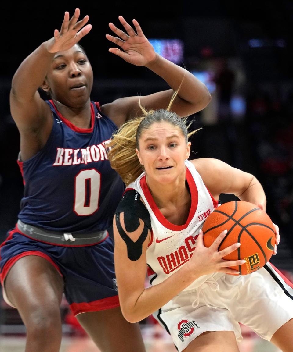 Dec 22, 2023; Columbus, OH, USA; Ohio State Buckeyes guard Jacy Sheldon (4) works around Belmont Bruins guard Tuti Jones (0) in the second half of their NCAA Womens Division I Basketball game against the Belmont Bruins at Value City Arena.