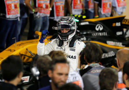 Formula One - F1 - Bahrain Grand Prix - Sakhir, Bahrain - 15/04/17 - Mercedes Formula One driver Valtteri Bottas of Finland celebrates pole position after the qualifying session. REUTERS/Hamad I Mohammed