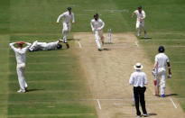 Australia's players celebrate the wicket of India's Ajinkya Rahane. REUTERS/Danish Siddiqui