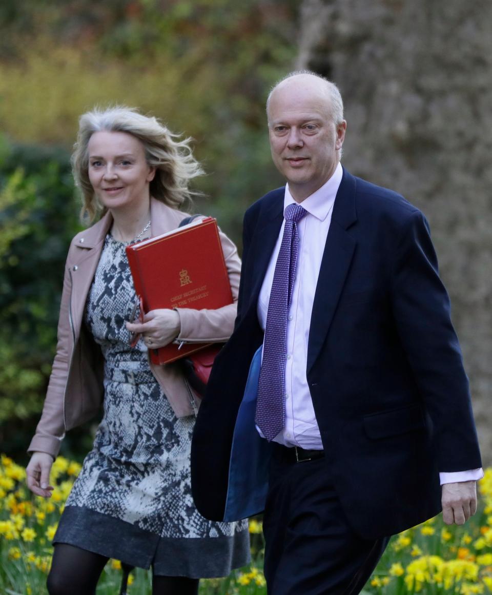 Liz Truss and Chris Grayling arriving for Monday's Cabinet meeting with Theresa May (AP)
