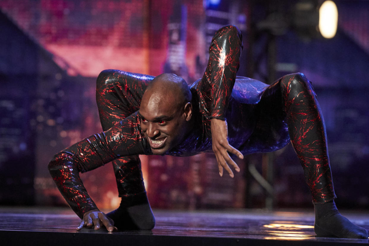 Contortionist Troy James bends his body in a red jumpsuit accessorised with red contact lenses during his Australia's Got Talent Audition on Sunday August 4th