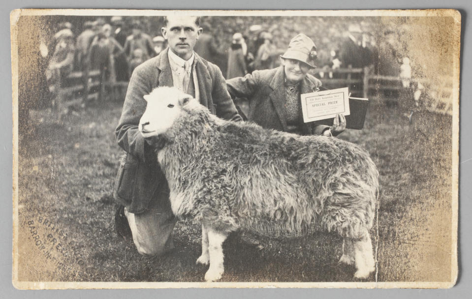 Tom Storey and Beatrix Potter with their prize-winning ewe named Water Lily at the Eskdale Show on September 26 1930 (National Trust/Robert Thrift/PA)