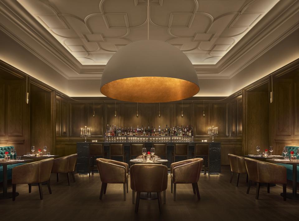 The Oak Room at the Abu Dhabi Edition, with its awe-inspiring light fixture—a Schrager signature.