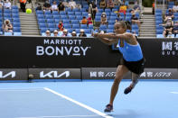 Leylah Fernandez of Canada plays a backhand return to Maddison Inglis of Australia during their first round match at the Australian Open tennis championships in Melbourne, Australia, Tuesday, Jan. 18, 2022. (AP Photo/Simon Baker)