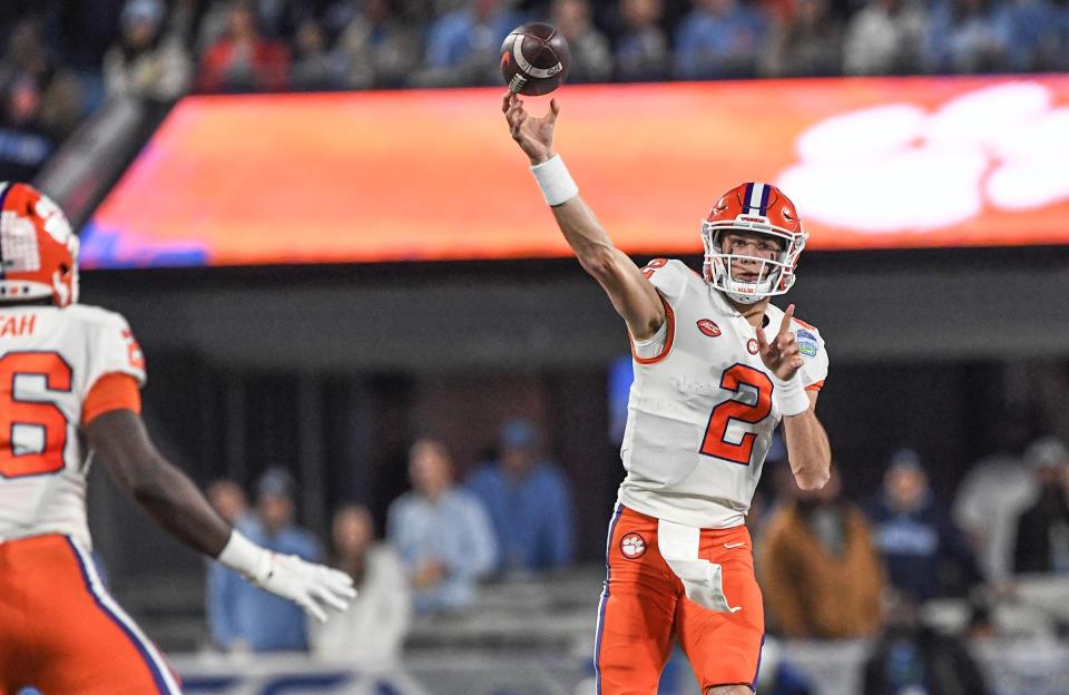 Clemson quarterback Cade Klubnik (2) passes against <a class="link " href="https://sports.yahoo.com/ncaaf/teams/n-carolina/" data-i13n="sec:content-canvas;subsec:anchor_text;elm:context_link" data-ylk="slk:North Carolina;sec:content-canvas;subsec:anchor_text;elm:context_link;itc:0">North Carolina</a> during the first quarter of the ACC Championship football game at Bank of America Stadium in Charlotte, North Carolina Saturday, Dec 3, 2022.<br><a class="link " href="https://sports.yahoo.com/ncaaf/teams/clemson/" data-i13n="sec:content-canvas;subsec:anchor_text;elm:context_link" data-ylk="slk:Clemson Tigers Football;sec:content-canvas;subsec:anchor_text;elm:context_link;itc:0">Clemson Tigers Football</a> Vs <a class="link " href="https://sports.yahoo.com/ncaaf/teams/n-carolina/" data-i13n="sec:content-canvas;subsec:anchor_text;elm:context_link" data-ylk="slk:North Carolina Tar Heels;sec:content-canvas;subsec:anchor_text;elm:context_link;itc:0">North Carolina Tar Heels</a> Acc Championship Charlotte Nc