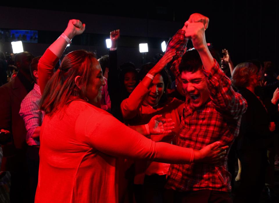 Liberal supports react as poll numbers come in at Liberal election headquarters in Montreal on Monday Oct. 21, 2019. THE CANADIAN PRESS/Sean Kilpatrick