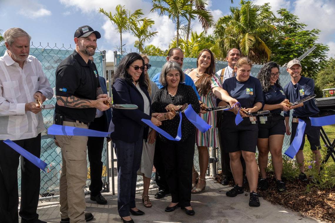 Miami-Dade County Mayor, Daniella Levine Cava, center, along with other elected officials and guests, cuts the ribbon to officially open a new turtle hospital. Zoo Miami hosted a grand opening for its new turtle hospital on July 6, 2022.
