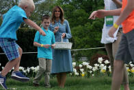 Melania Trump wore a denim Michael Kors dress for the 141st Easter Egg Roll on the South Lawn of the White House. [Photo: Getty]