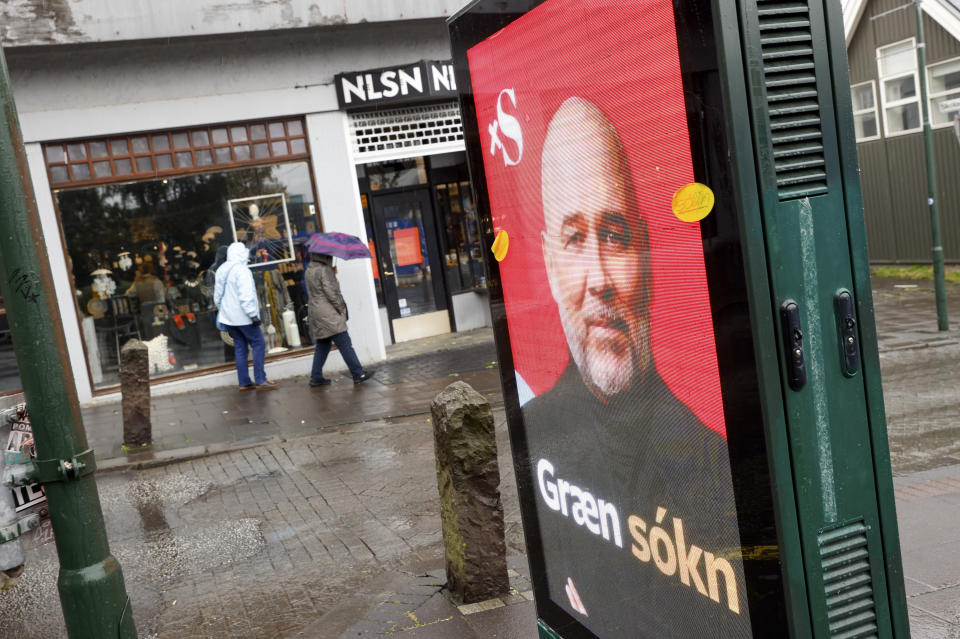 An election poster from the Social Democratic Alliance, saying "green attack" in Reykjavik, Iceland, Wednesday, Sept. 22, 2021. Climate change is top of the agenda when voters in Iceland head to the polls for general elections on Saturday, following an exceptionally warm summer and an election campaign defined by a wide-reaching debate on global warming. (AP Photo/Brynjar Gunnarsson)