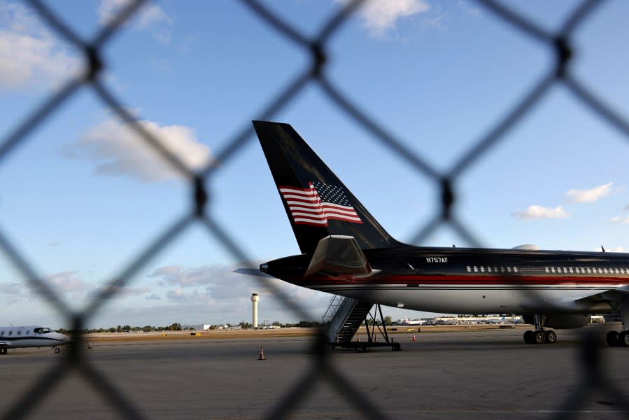 In this file photo, the Trump Organization’s Boeing 757, known as Trump Force One, sits parked on the tarmac at the Palm Beach International Airport on March 31, 2023 in West Palm Beach, Florida. (Photo by Alon Skuy/Getty Images)