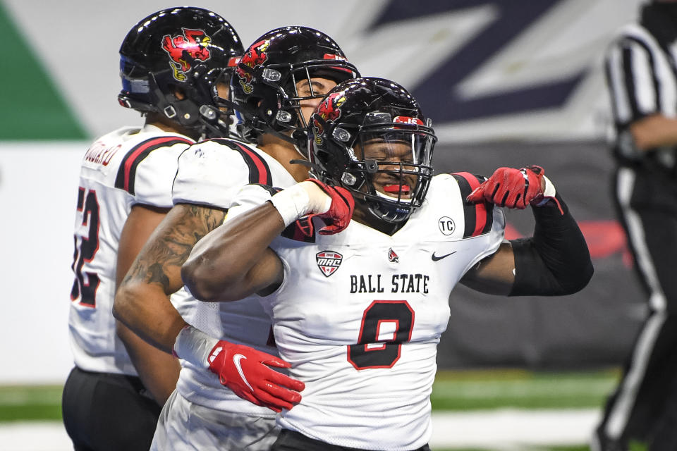 DETROIT, MICHIGAN - DECEMBER 18: Christian Albright #9 of the Ball State Cardinals celebrates after recovering a fumble for a touchdown against the Buffalo Bulls at Ford Field on December 18, 2020 in Detroit, Michigan. (Photo by Nic Antaya/Getty Images)