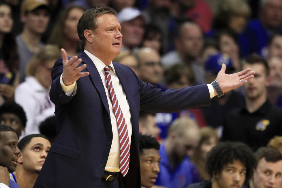 Kansas head coach Bill Self questions a call during the first half of an NCAA college basketball game against Oklahoma State in Lawrence, Kan., Monday, Feb. 24, 2020. (AP Photo/Orlin Wagner)