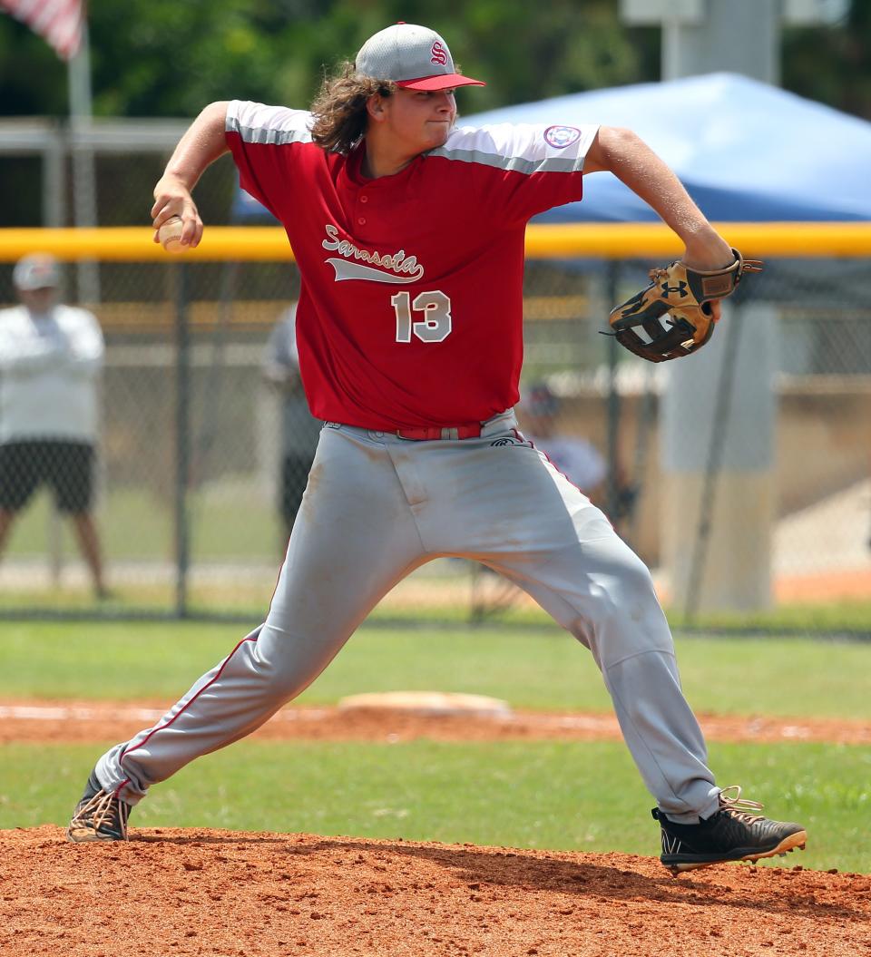 Jackson Bradley of the Sarasota U15 All-Stars delivers a pitch against the Okeeheelee All-Stars on Sunday, July 17, 2002, in the South Florida State Championship game at the Sarasota BRL field.