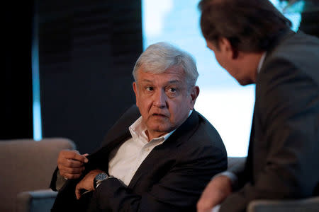 Leftist front-runner Andres Manuel Lopez Obrador of the National Regeneration Movement (MORENA) gestures before addressing the audience during a conference organised by the Mexican Construction Industry Association in Guadalajara, Mexico March 23, 2018. REUTERS/Henry Romero