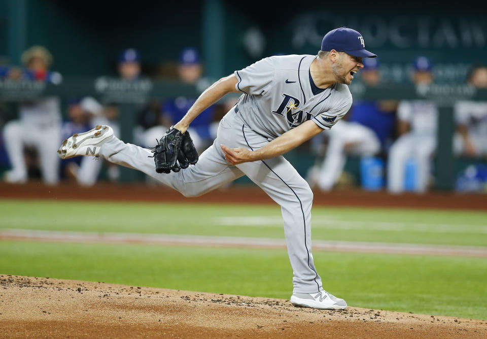 Tampa Bay Rays starting pitcher Rich Hill (14) throws during the first inning of a baseball game against the Texas Rangers, Saturday, June 5, 2021, in Arlington, Texas. (AP Photo/Brandon Wade)