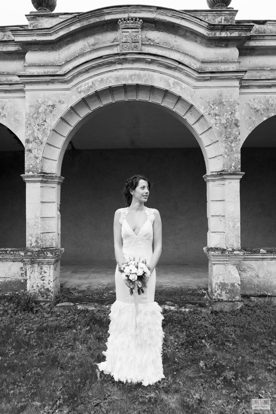 This photo provided by Laetitia Drouet, of France-based Kamelion Couture, shows a wedding dress created by her which was inspired by the Bea Johnson book "Zero Waste Home." The dress was made with pieces of fabric scraps that were destined for the trash. As environmental awareness grows, many couples are saying "I do" to Zero-Waste weddings. They're trying to cut back on trash _ everything from floral design and dresses to invitations and food.(comme1envie/Kamelion Couture via AP)