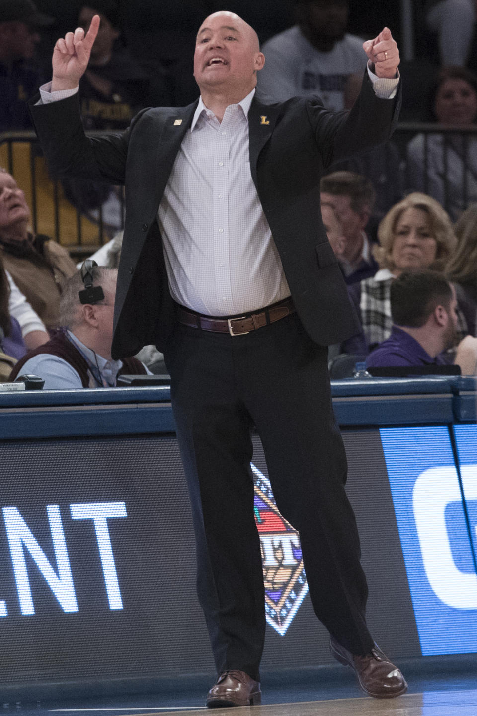 Lipscomb head coach Casey Alexander react during the first half of a semifinal college basketball game in the National Invitational Tournament against Wichita State , Tuesday, April 2, 2019, at Madison Square Garden in New York. (AP Photo/Mary Altaffer)