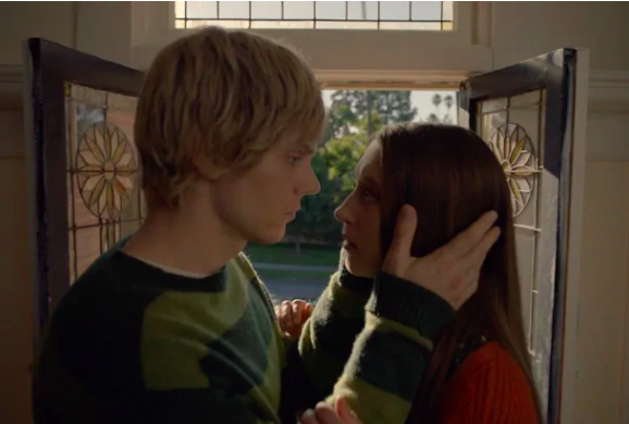 "American Horror Story: Murder House" character Tate and Violet stare into each other's eyes, while Tate holds her face close