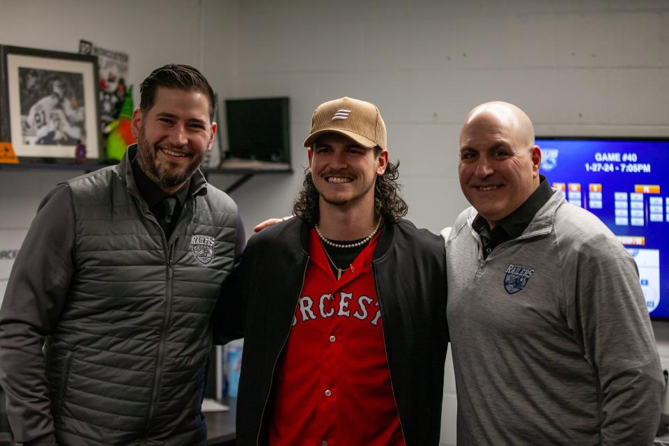 Former WooSox player Ryan Fitzgerald, center, poses for a picture before the Worcester Railers game at the DCU Center Saturday with Railers coach Jordan Lavallee-Smotherman and assistant coach Bob Deraney.