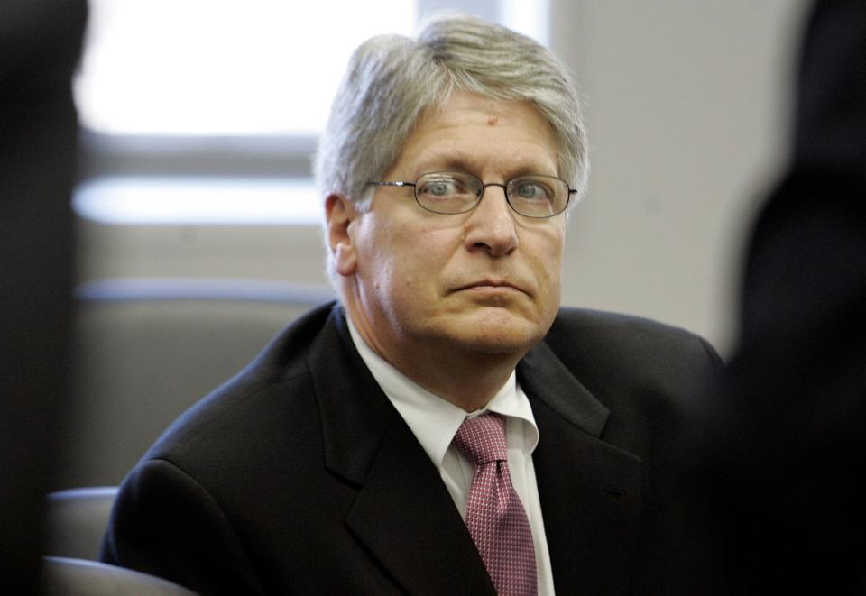 Former Durham County district attorney Mike Nifong listens during a North Carolina state bar hearing in 2007. Nifong was jailed and disbarred for misconduct in a high-profile case.