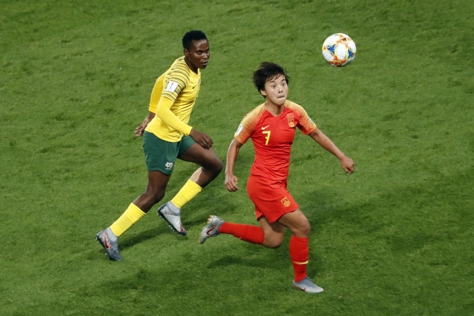 China's Wang Shuang, right, challenges for the ball with South Africa's Noko Matlou, left, during the Women's World Cup Group B soccer match between China and South Africa at the Parc des Princes in Paris, France, Thursday, June 13, 2019. (AP Photo/Thibault Camus)