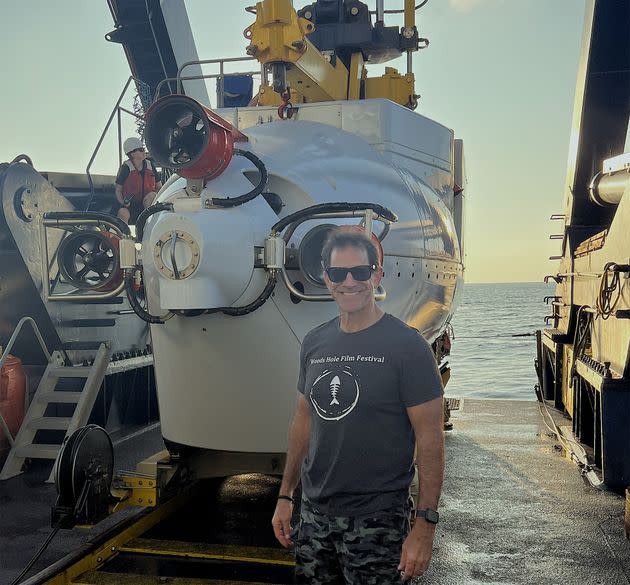 Bruce Strickrott, the manager and chief pilot of Alvin, stands in front of the submersible during a recent expedition. He has piloted about 400 dives in the historic vessel.