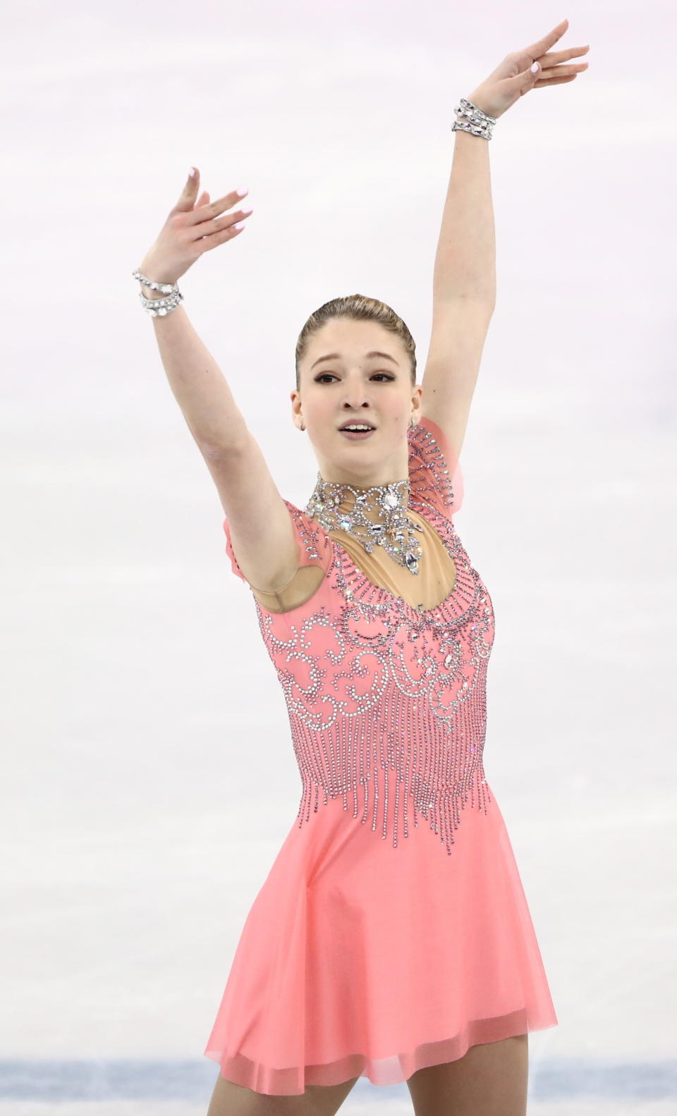 The skater from Russia was pretty in pink for her ladies short program. It's the embellished neckline and cuffs that really make this costume pop, though.&nbsp;