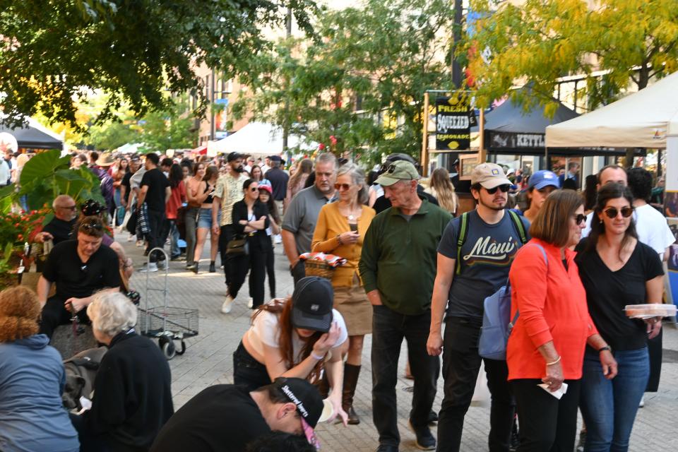 Thousands walked the Ithaca Commons at the Ithaca Apple Harvest Festival Sept 30, 2023.
