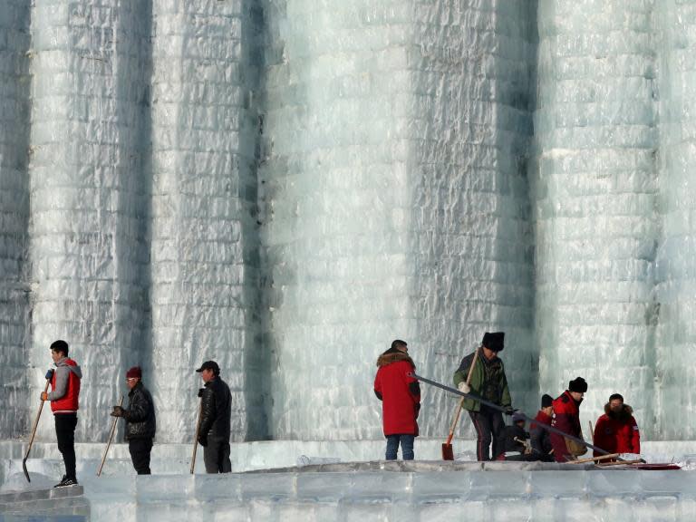 Ice sculptures melt at Chinese winter festival after sudden warm spell