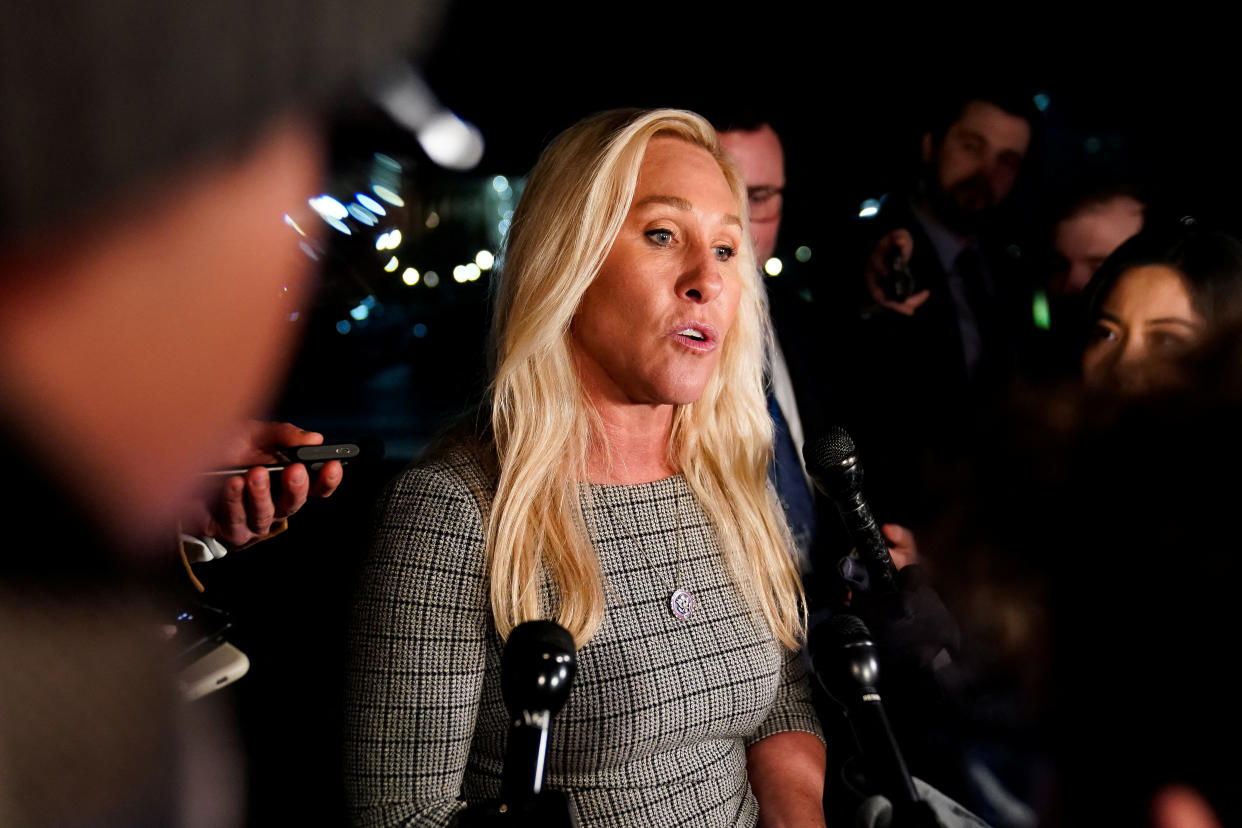 Marjorie Taylor Greene speaks to reporters after the House voted to impeach Homeland Security Secretary Alejandro Mayorkas.