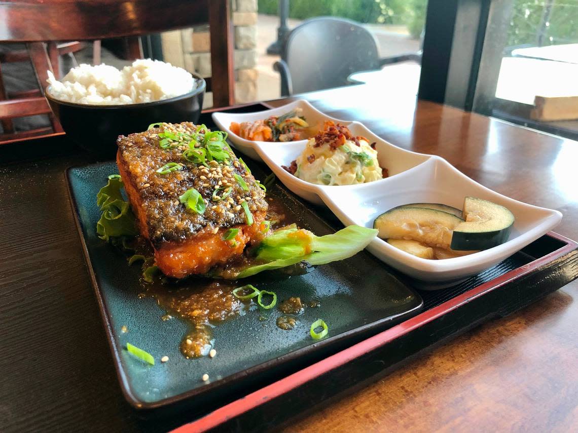 Kuji Asian Grill’s salmon plate lunch comes with potato macaroni salad, pickles, rice and kimchi.