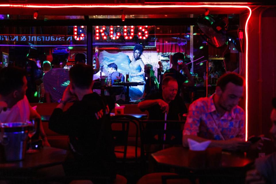 A drag queen performs on Silom Soi 4, a street known for LGBTQ nightlife, on May 5,