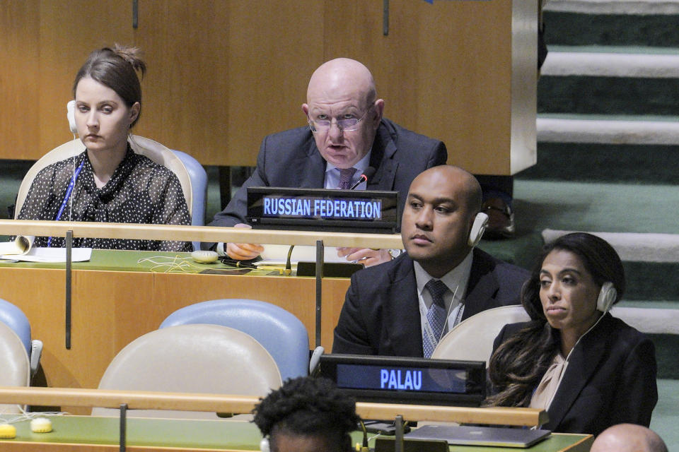 United Nations Ambassador from Russia, Vasily Nebenzya, second from left, address the U.N. General Assembly before it voted on a resolution condemning Russia's illegal referendum in Ukraine, Wednesday Oct. 12, 2022 at U.N. headquarters. (AP Photo/Bebeto Matthews)