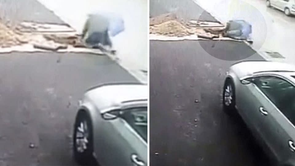 The elderly woman slips and tumbles down the manhole. Photo: YouTube