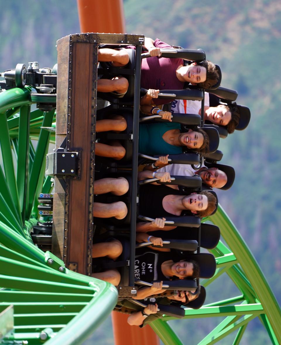 Alex Morrall, Taryn Miller, Mason Main and Nicole Mathena, all 17, react as they ride the Defiance rollercoaster at Glenwood Caverns Adventure Park in Glenwood Springs, Colorado.