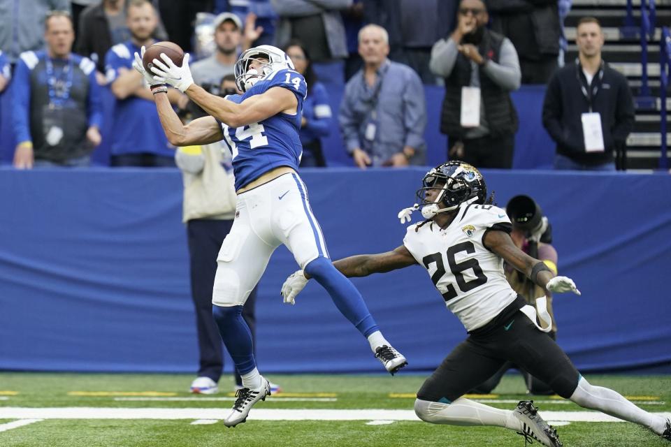 Indianapolis Colts' rookie receiver Alec Pierce (14) catches a 32-yard, game-winning TD pass against Jaguars' cornerback Shaquill Griffin, part of a disappointing day for the team's defense.