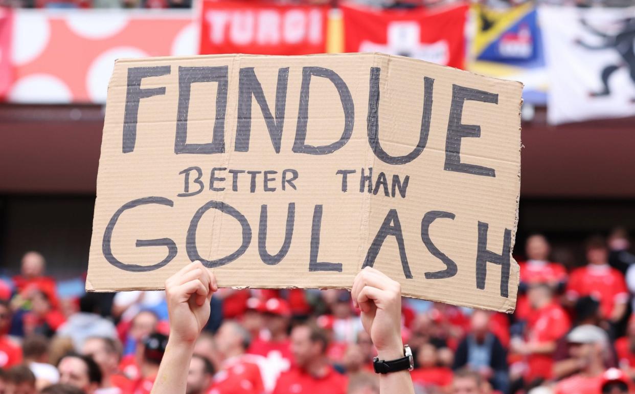 Banners at the Switzerland vs Hungary match participated in the new 'food wars' trend