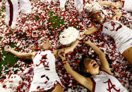 Alabama Crimson Tide cheerleaders celebrate after Alabama defeated the Notre Dame Fighting Irish in their NCAA BCS National Championship college football game in Miami, Florida, January 7, 2013. REUTERS/Chris Keane (UNITED STATES - Tags: SPORT FOOTBALL) 