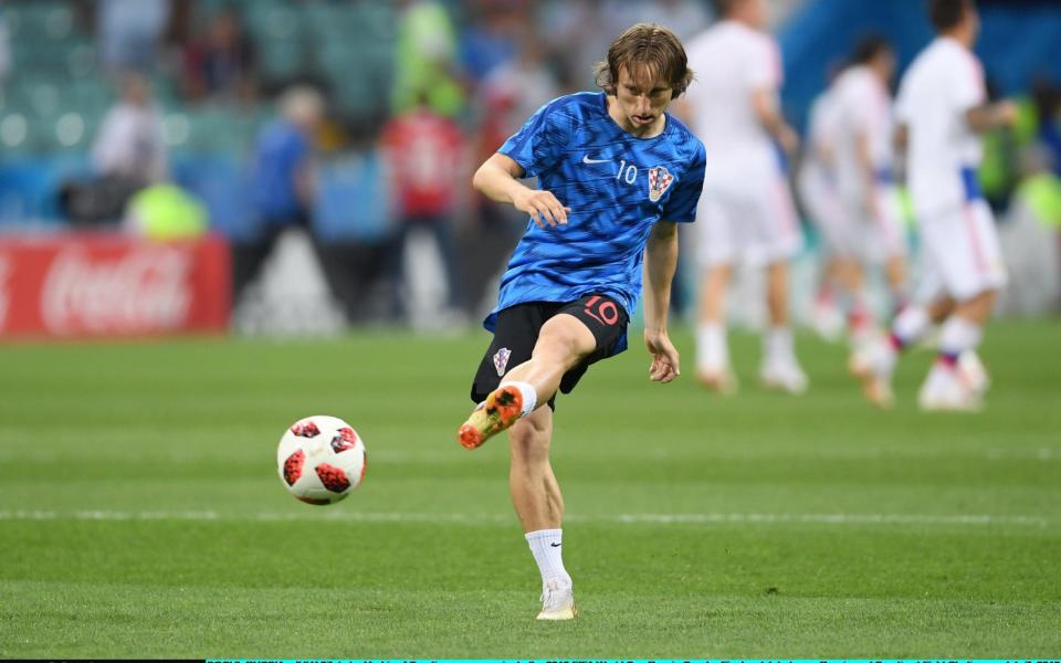 <p>Croatia captain Luka Modric warms up pre-match </p>