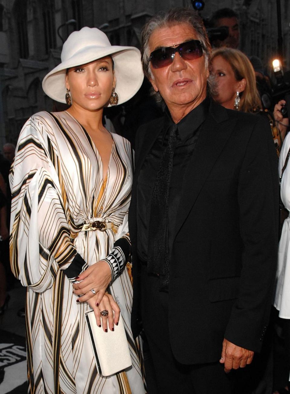 PHOTO: Jennifer Lopez and Designer Roberto Cavalli at the Just Cavalli New York Flagship store opening during Mercedes-Benz Fashion Week Spring 2008, Sept. 7, 2007, in New York City.   (Larry Busacca/WireImage)